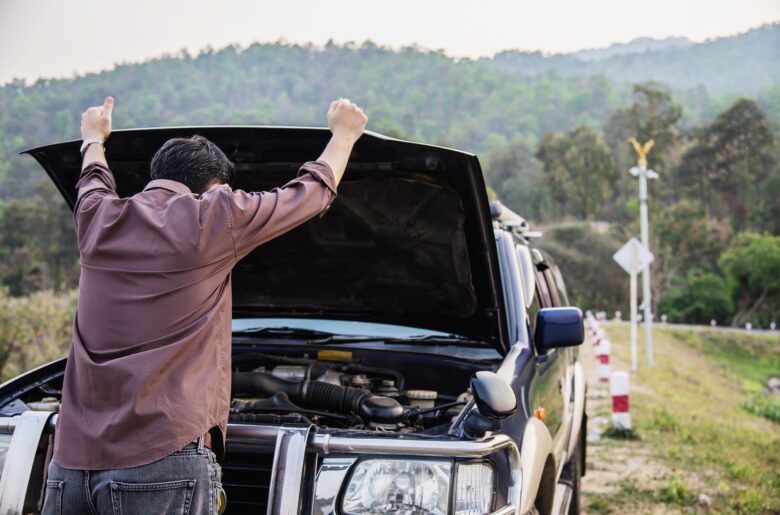 man-try-fix-car-engine-problem-local-road-chiang-mai-thailand (1)