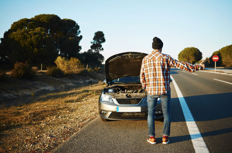 Cars - driver trying stop car in travel because his car broken.